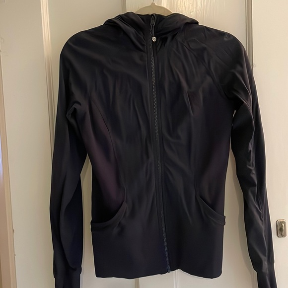 Lululemon navy blue running jacket with hood. - Picture 1 of 3
